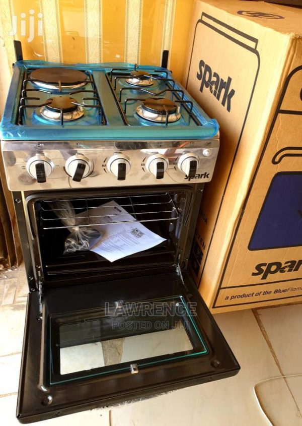 Spark Cooker 3gas burners and 1electric plate