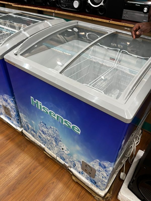 The Hisense 290 Litres Showcase Display Freezer is a commercial-grade freezer designed for businesses needing to display frozen products such as beverages, ice creams, frozen foods, and more. Here are some features you might find useful: Key Features Capacity: 290 litres, providing ample storage space for a variety of products. Glass Door: Transparent glass door for easy visibility of contents, perfect for showcasing products to customers. Temperature Control: Adjustable thermostat to maintain the desired freezing temperature. Shelving: Multiple shelves to organize products efficiently. LED Lighting: Interior LED lighting for better visibility and an appealing display. Energy Efficient: Designed to be energy-efficient, helping to reduce electricity costs. It's ideal for use in supermarkets, convenience stores, cafes, and other retail spaces requiring reliable cold storage with product visibility. If you’re considering one for your business, ensure it meets your space and storage needs.